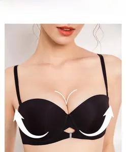 Close-up of black push-up bra featuring delicate straps and decorative center buckle