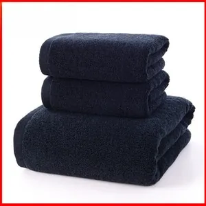 Detail view of deep blue coral fleece fabric with dense absorbent loop pile texture