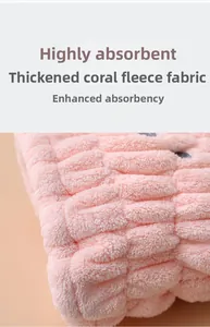 Macro detail of thick pink coral fleece fabric with ultra-absorbent hair towel texture