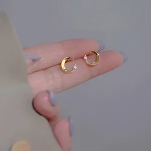 Minimalist S925 sterling silver 14K gold moon stud earrings with a tiny white zircon