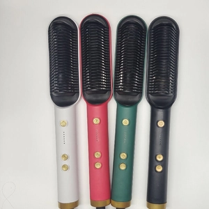 Detail view of ionic hair straightener brush in white, pink, green, and black colors