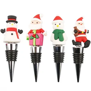 Set of 4 Christmas wine stoppers featuring Santa Claus and snowman characters with rubber seals