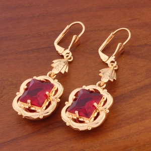 Retro golden lever-back earrings with rectangle red crystal stone and leaf charms