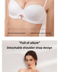 Detail of white strapless bra featuring soft underwire support and deep V-neckline design