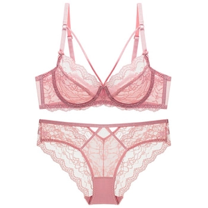 Detailed view of pink French floral lace lingerie set with corset style boning and embroidery