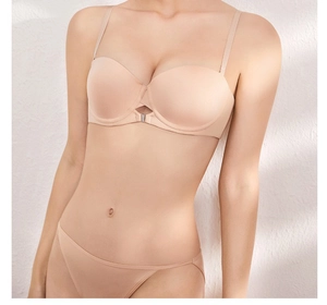 Front closure seamless beige lingerie set with rhinestone detail and silky fabric texture