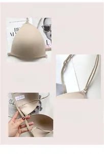 Detailed close-up of seamless beige bralette with adjustable straps and front buckle design