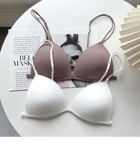 Detail of thin adjustable straps and seamless smooth cups on French style wireless bras