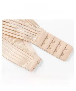 Detail of the elastic wide hem and two-row hook back closure on the seamless nude bra