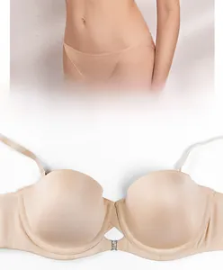 Detail of nude seamless push-up bra featuring a front closure with rhinestone buckle