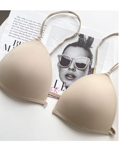 Detail of seamless nude wireless bra with smooth fabric and slim adjustable straps