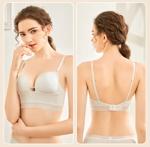 Close-up of seamless beige wire-free bra set with deep V-neck and semi-sheer stripe band
