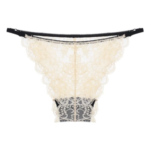 Sultry beige floral lace panties with black elastic straps and transparent mesh texture