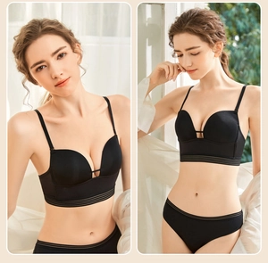 Detail of black seamless lingerie set with wide band and semi-transparent stripes