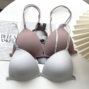 Front closure seamless French wireless bras in pink and grey colors on white background