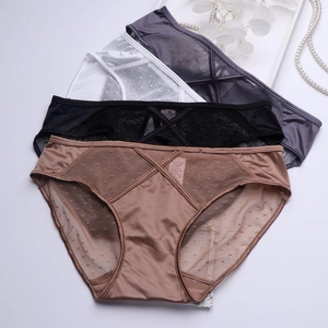Detailed view of satin and polka dot lace panties with stylish back criss-cross straps