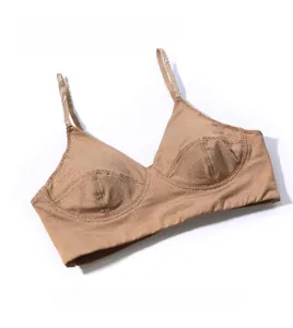 Close-up of seamless wireless camel bra with breathable fabric and deep V neck design