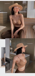 Detail of thin straps and V-neckline on a seamless brown wireless bra top