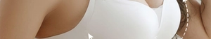 Close-up of white seamless bra showing side support and push-up effect on model