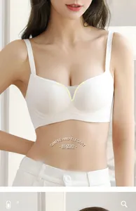 Close-up of white seamless bra with V-neck mesh layer and thin shoulder straps