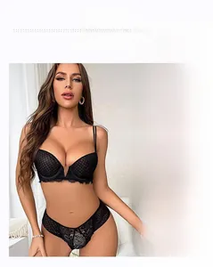 Detail of black lace lingerie set featuring breathable dot mesh and v-neck bra