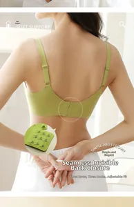 Detail of light green seamless bra featuring adjustable three-row hook and eye back closure