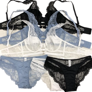 Lace embroidery lingerie set in black, blue and white with mesh paneling and underwire