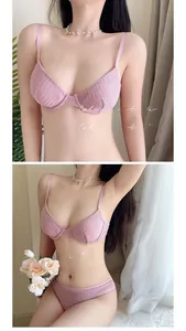 Detailed close-up of pink waffle texture lingerie set with supportive underwire and lace