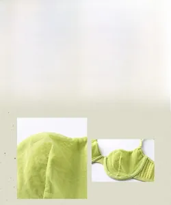 Close-up of lime green sheer mesh bra featuring breathable fabric and supportive underwire