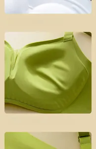 Detail showing seamless W-shaped soft support and integrated fixed padding of the green bra