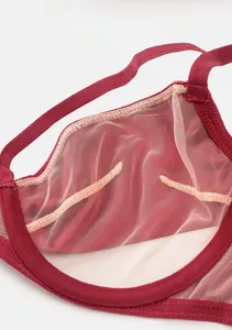 Detail of dark red thin mesh bra cup showing breathable 0.01cm ultra-thin fabric