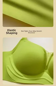 Detail view of avocado green seamless bra with four-way stretch fabric and molding texture