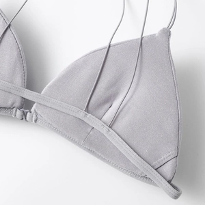 Grey front-closure triangle bralette with ribbed texture and thin shoulder straps