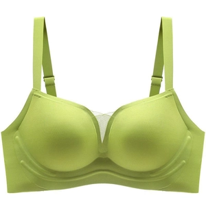 Seamless green push-up bra with V-neck mesh detail and wide shoulder straps