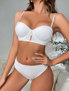 Detailed view of white seamless push-up bra set with stylish cutout and matching panties