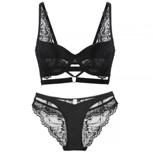Sexy black lace lingerie set with floral embroidery and strappy details on white background