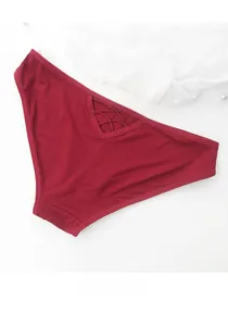 Detailed back view of sexy wine red cotton panties with cross strap cutout design