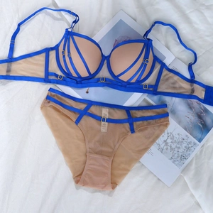 Ensemble lingerie cage bleu sexy avec dentelle transparente et bandes contrastées