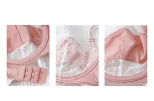 Détail de soutien-gorge en dentelle rose avec triple agrafe et broderie florale