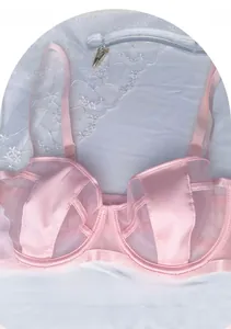 Detail view of pink ultra-thin mesh lace bra with underwire and adjustable straps