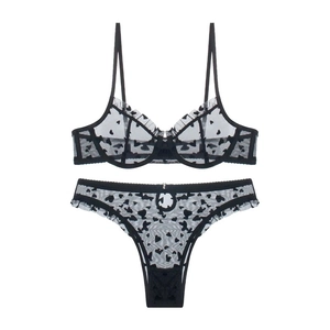 Sexy black sheer mesh lingerie set with velvet heart patterns and ruffle trim details