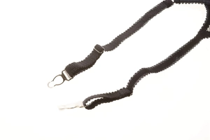 Detail of black elastic garter strap with wave lace trim and silver metal clip fasteners