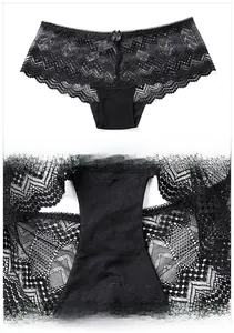 Detail of sexy black lace panties showing delicate floral patterns and cotton crotch lining