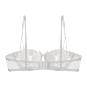 Detailed back view of white lace bra featuring rose embroidery and adjustable thin straps