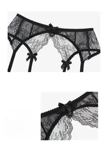 Detail of floral lace garter belt with elegant satin bows and elastic straps for stockings