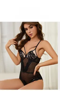 Detail of black lace deep V-neck teddy bodysuit with polka dot mesh and sheer texture