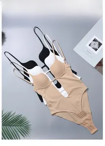 Detailed view of seamless deep V-neck bodysuits in black, white and beige colors