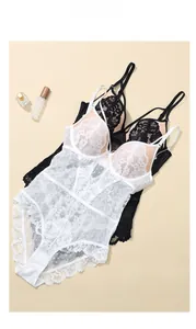 Detailed flat lay of floral lace bodysuits with sheer mesh and delicate straps
