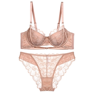 Pink floral lace lingerie set with full coverage bra and matching sheer panties on white