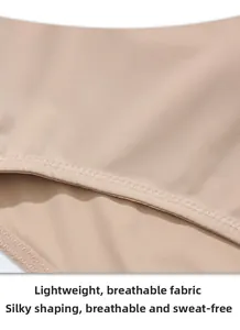Macro shot of breathable silk-touch fabric with precision zigzag stitching for bodysuit